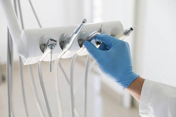Professional Tooth Extraction technician working in New Braunfels, TX